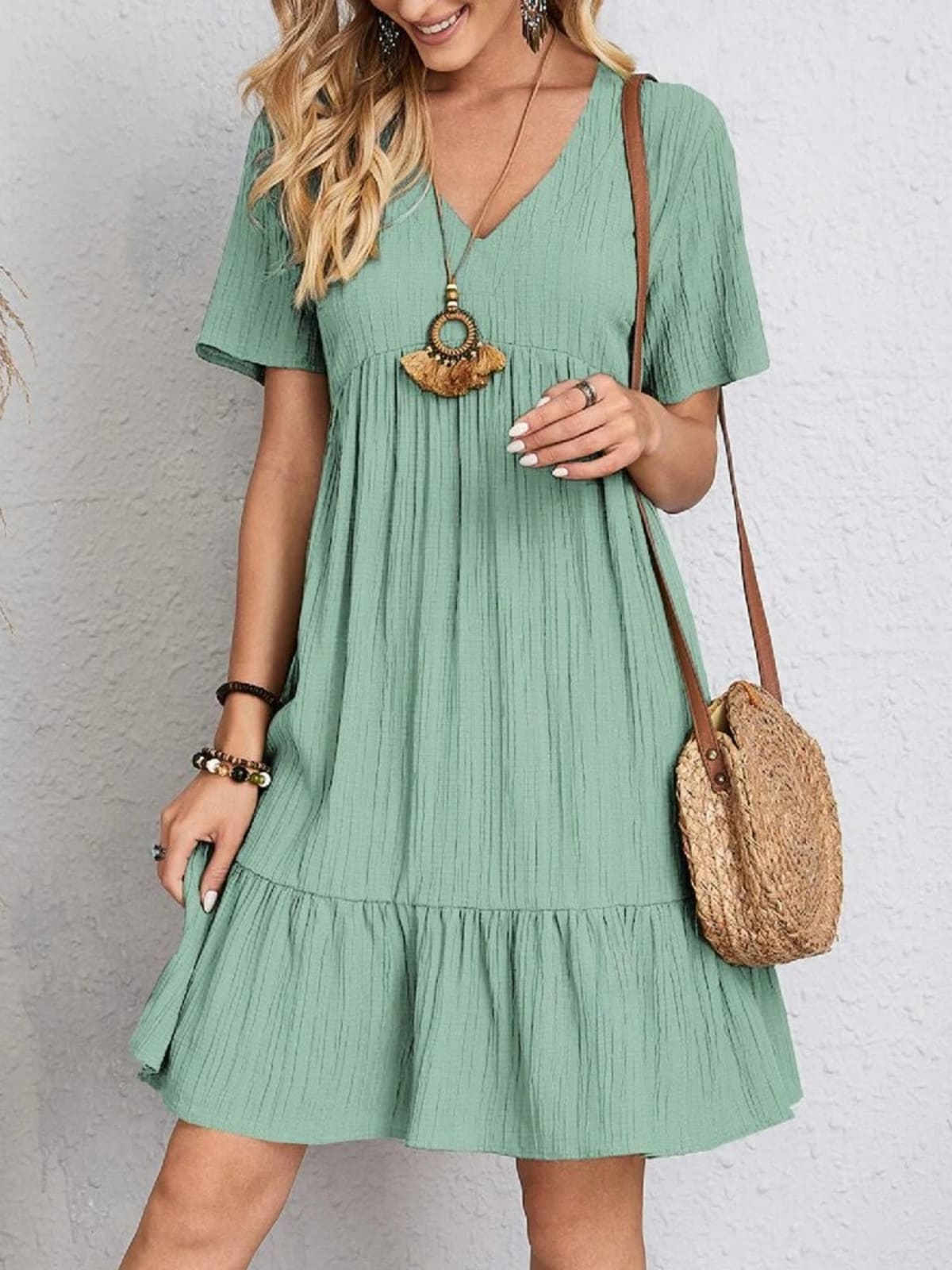 Layered dress with belly coverage, flattering silhouette.