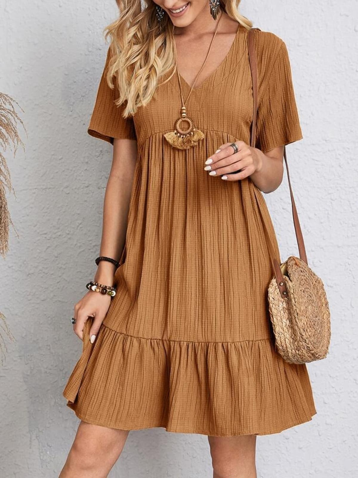 Layered dress with belly coverage, flattering silhouette.