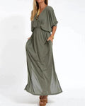 Long flowing dress with tailored fit and lightweight fabric.