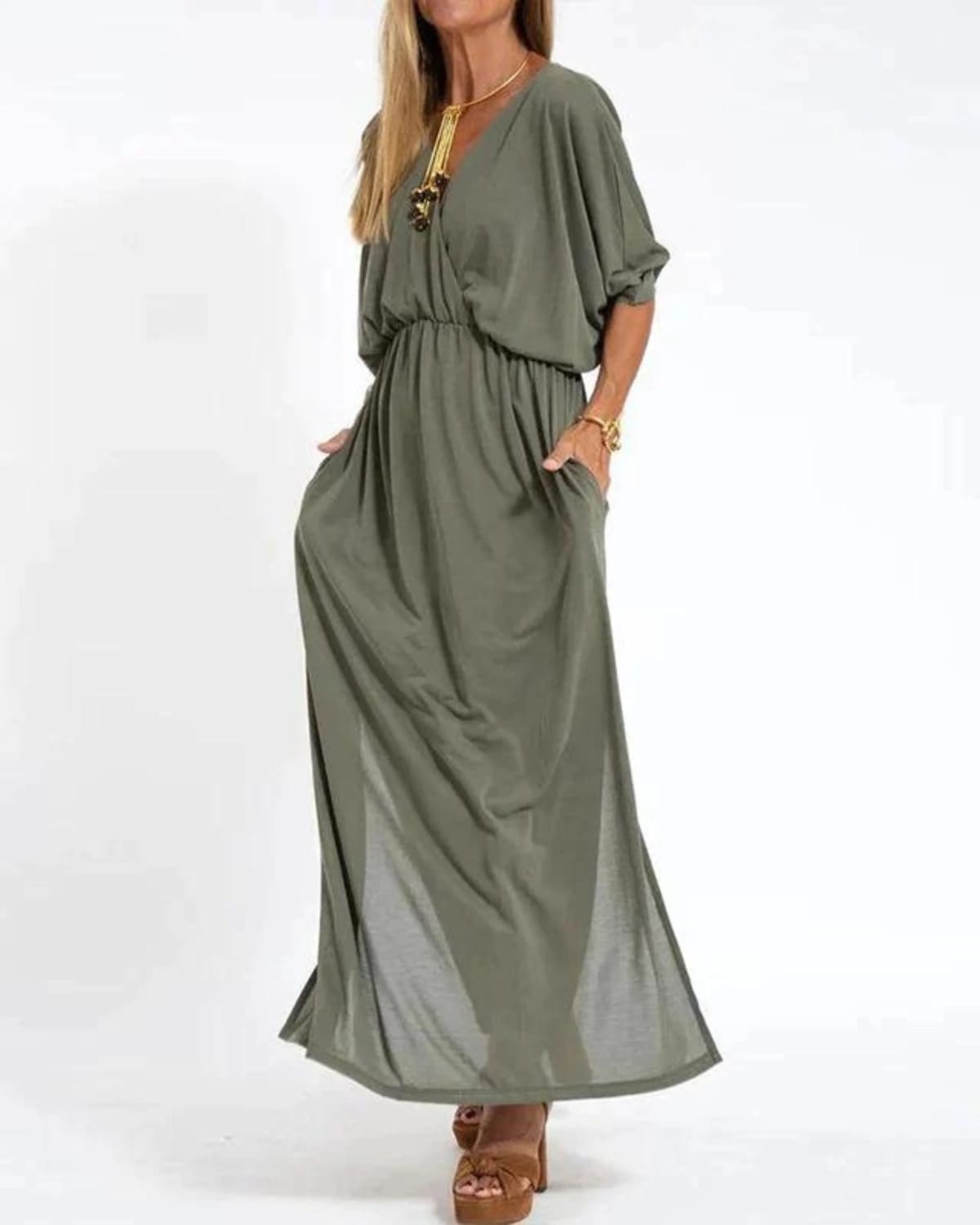 Long flowing dress with tailored fit and lightweight fabric.
