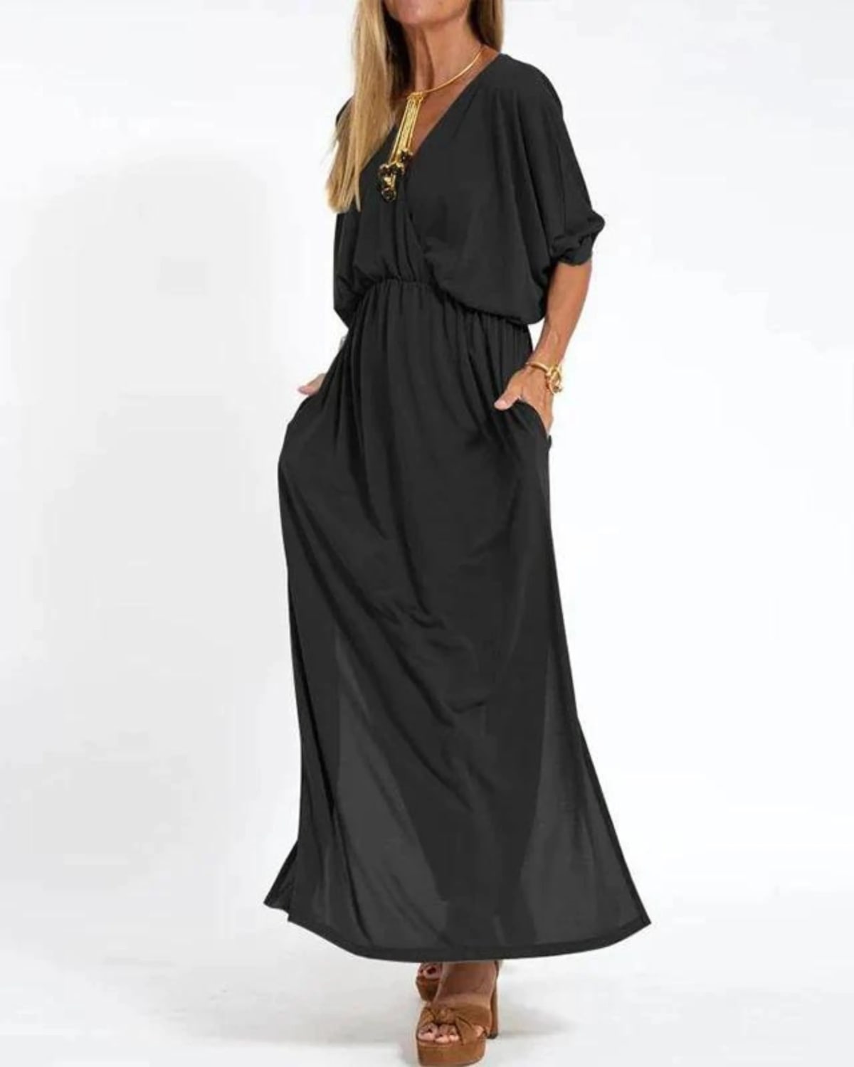 Long flowing dress with tailored fit and lightweight fabric.