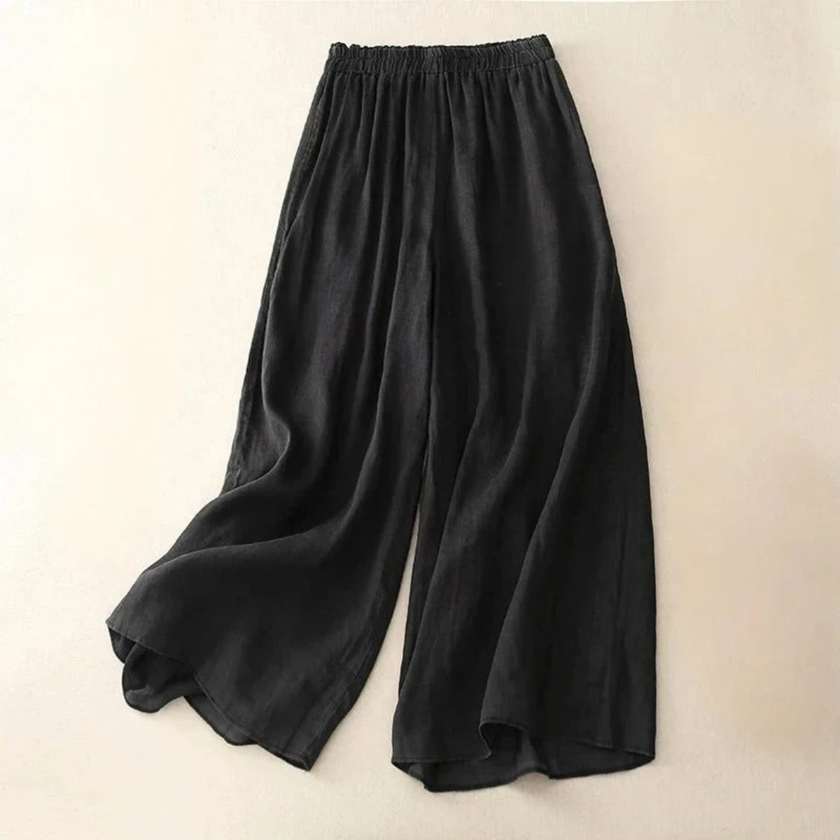 Loose waistband pants with straight leg and breathable fabric.