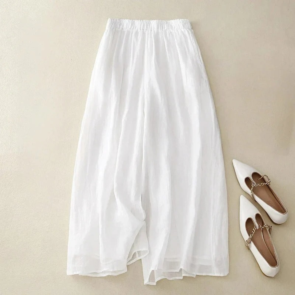 Loose waistband pants with straight leg and breathable fabric.