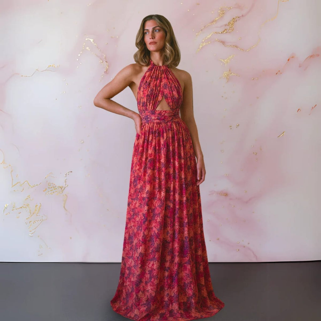 Floral maxi dress with open back and flowing silhouette.