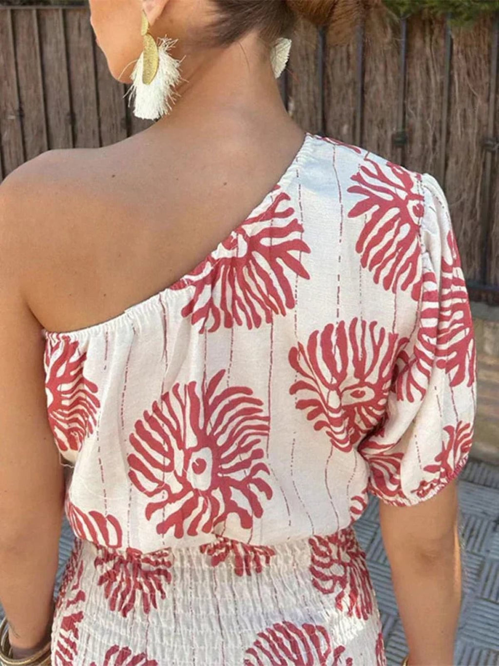 A short dress with relaxed fit and light fabric drape.
