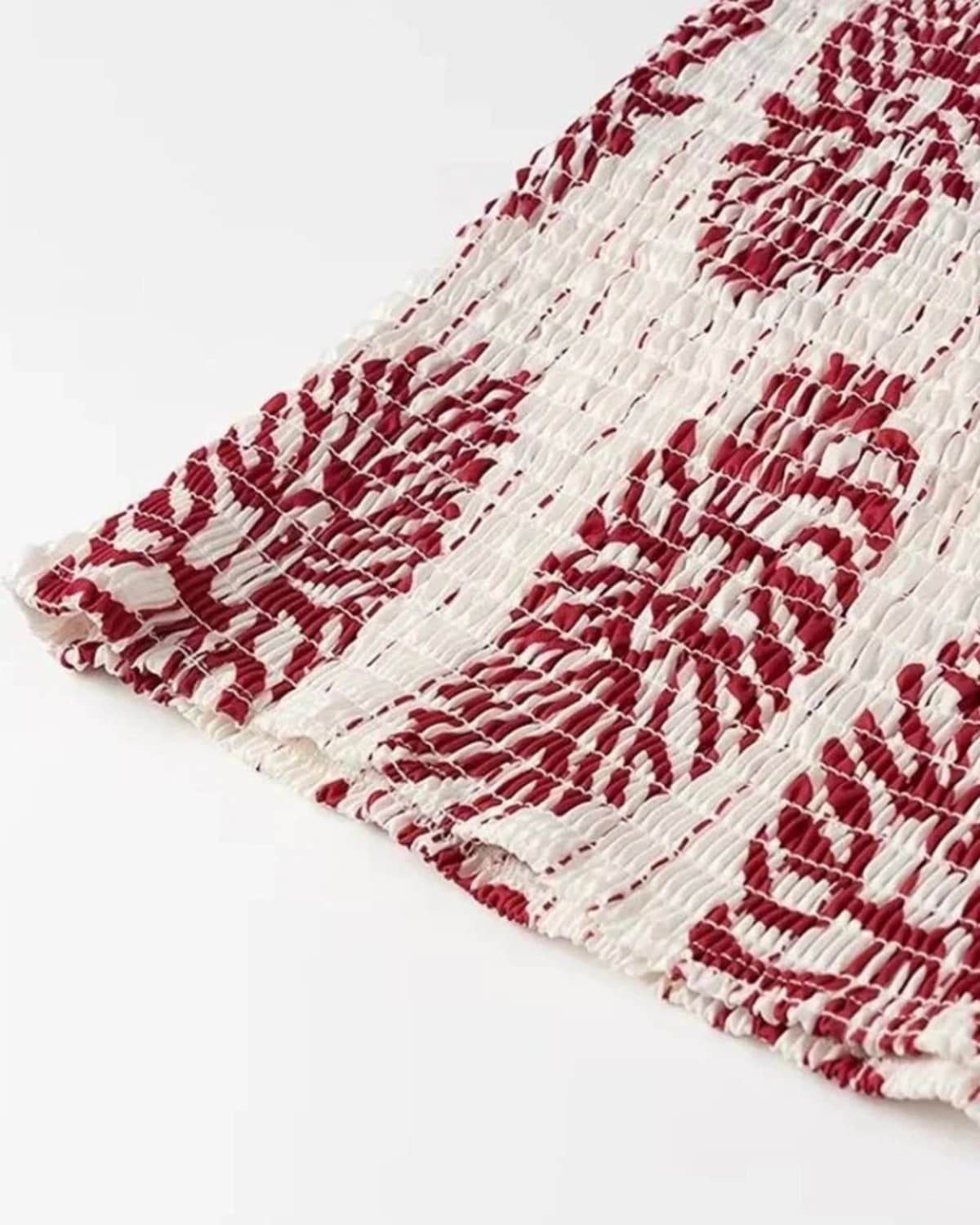 A short dress with relaxed fit and light fabric drape.