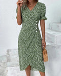 V-neck dress with flowing silhouette ideal for events