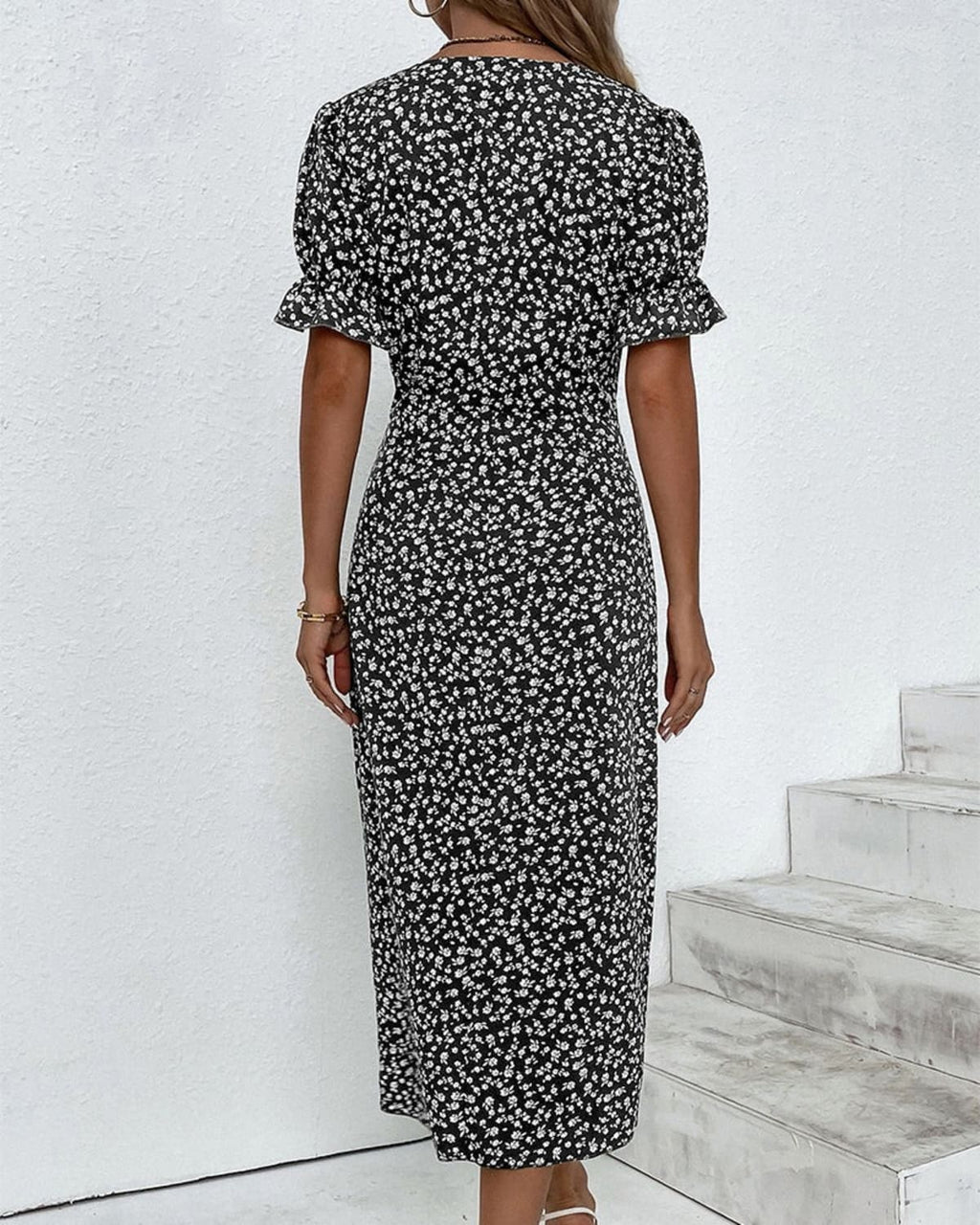 V-neck dress with flowing silhouette ideal for events