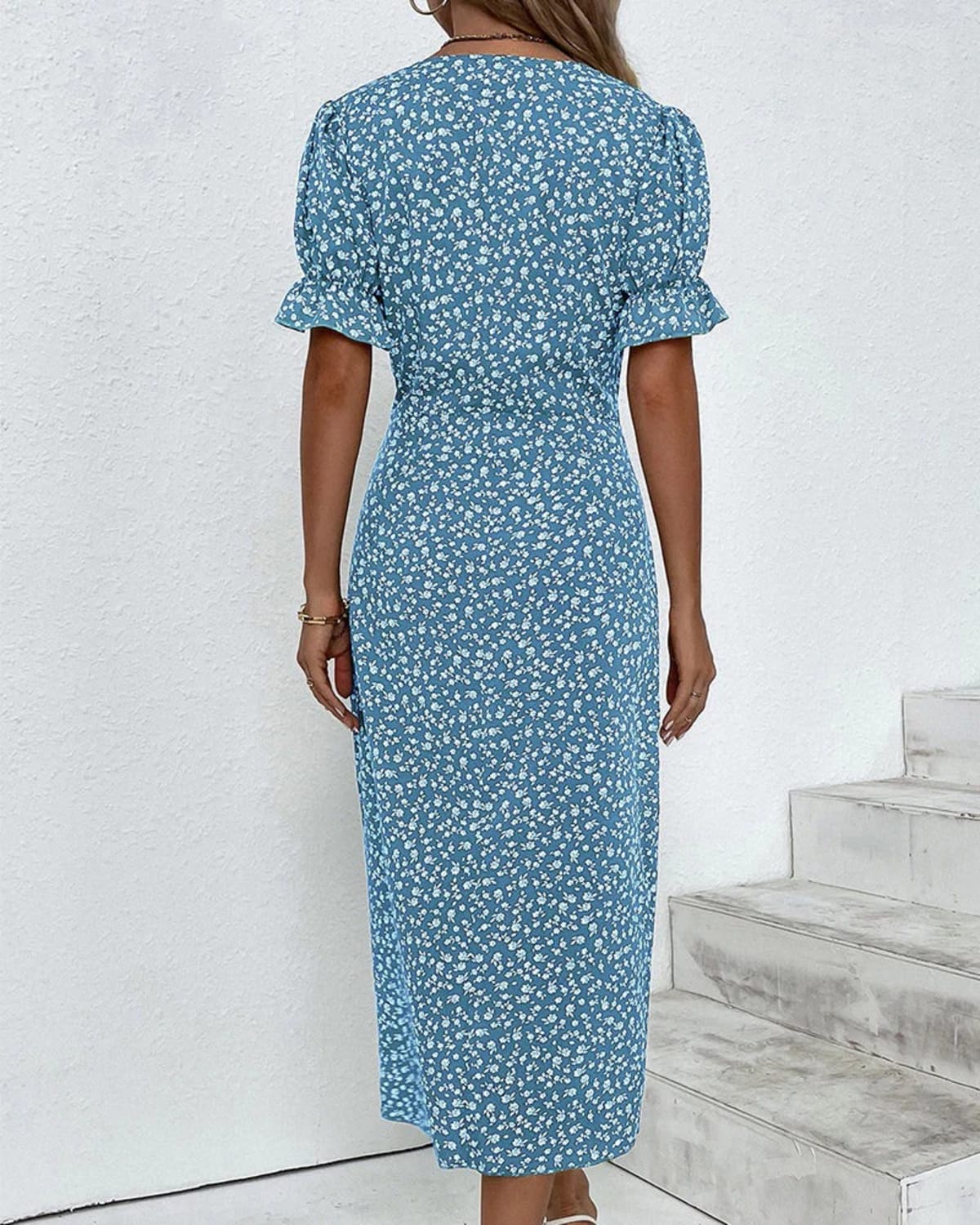 V-neck dress with flowing silhouette ideal for events