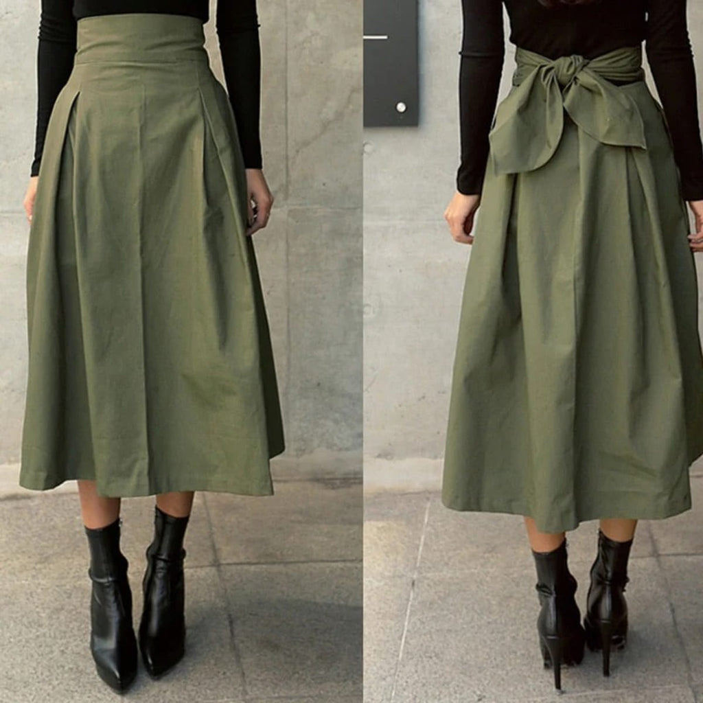 Woman wearing A-line midi wrap skirt with self-tie waist outdoors