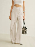 Women's high-waisted wide-leg trousers with wrap front.