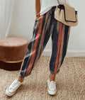 Trousers with drawstring waist and clean tapered silhouette.