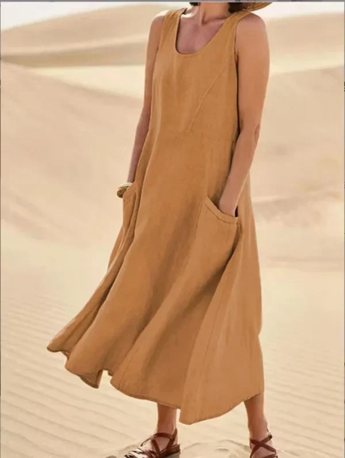 Mid-length dress with relaxed fit and flattering silhouette.