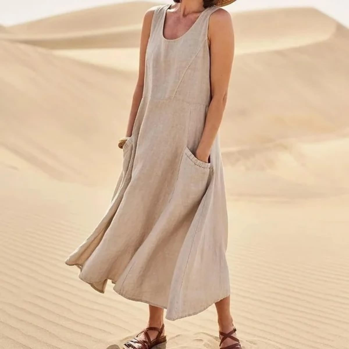Mid-length dress with relaxed fit and flattering silhouette.