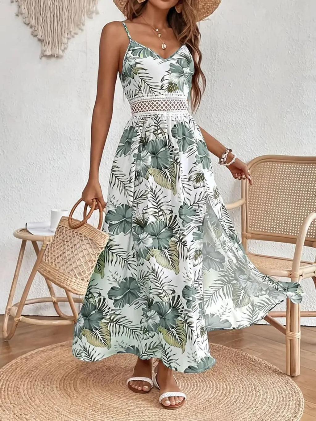 Women's floral midi dress with relaxed fit and soft drape.