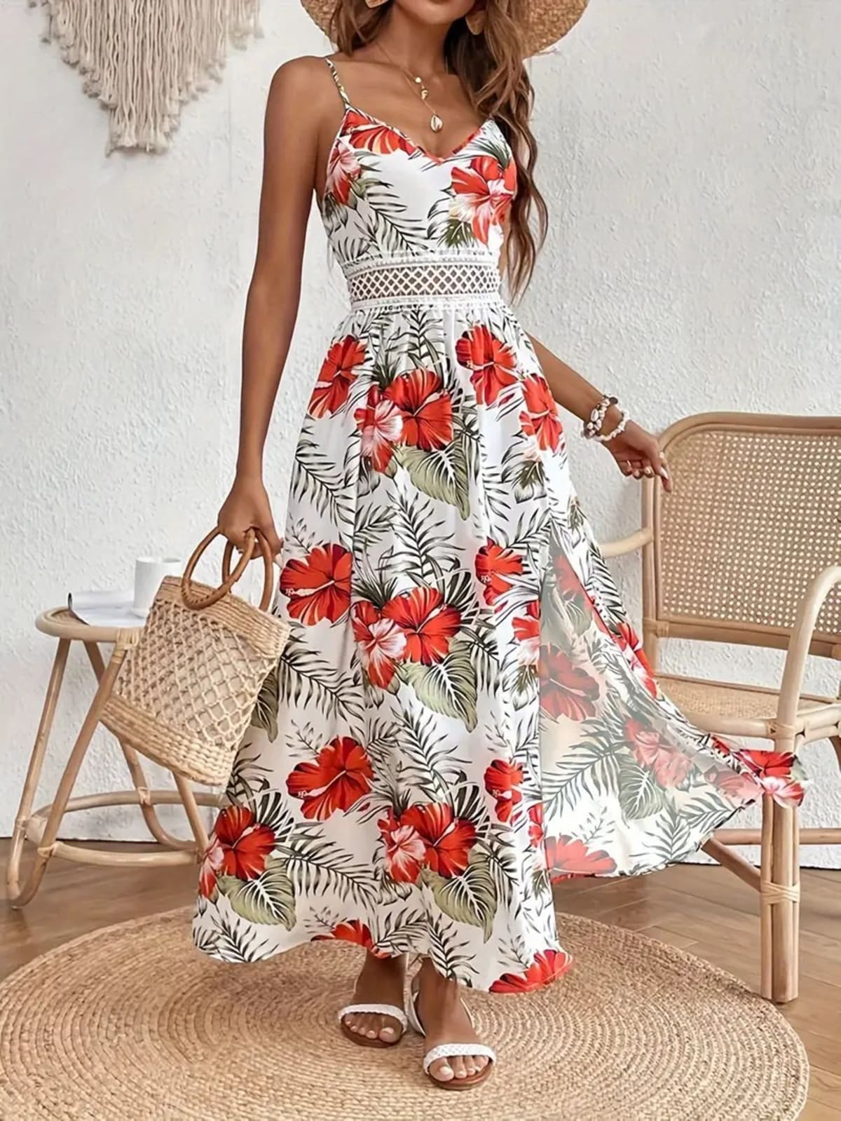 Women's floral midi dress with relaxed fit and soft drape.