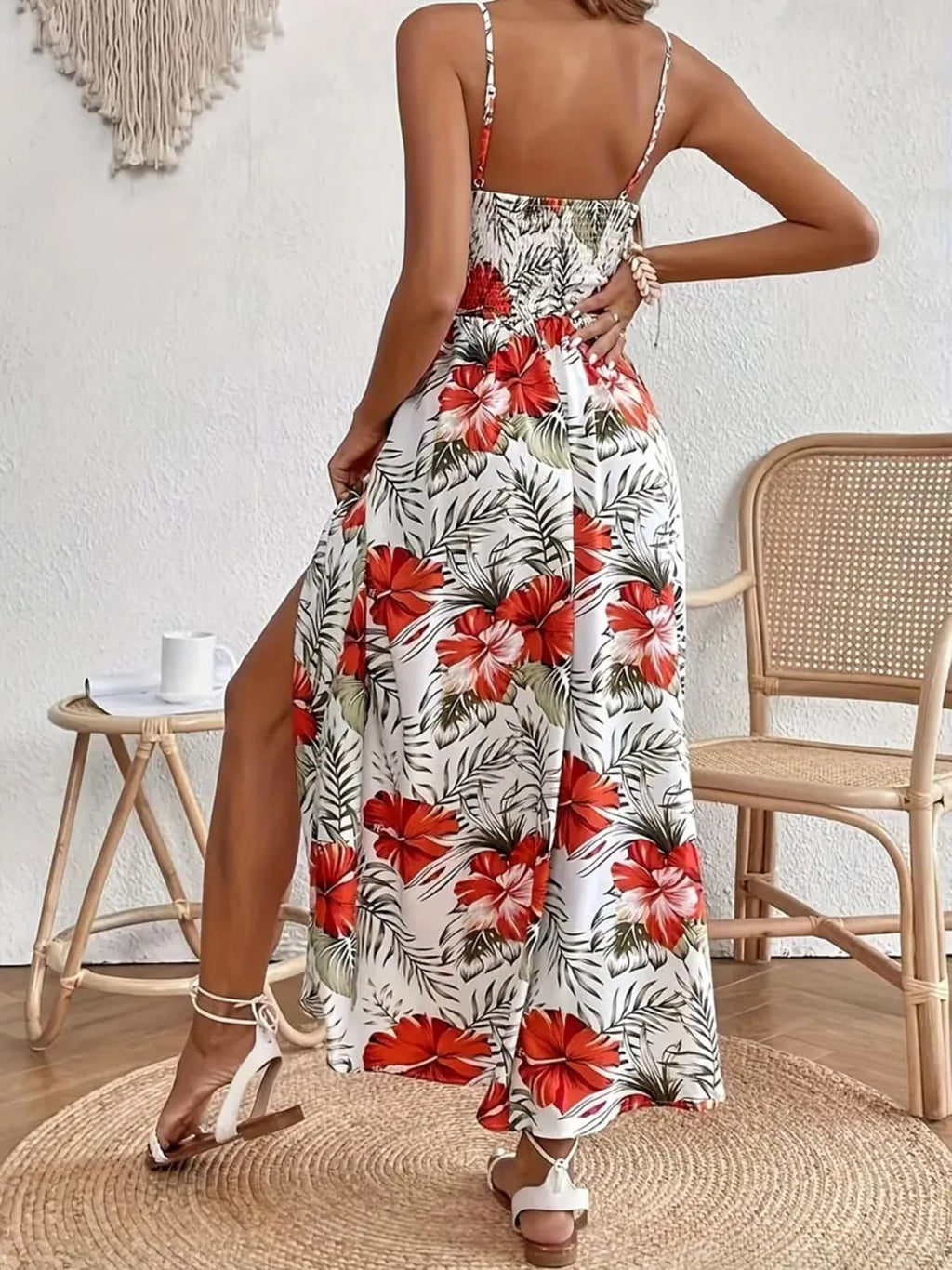 Women's floral midi dress with relaxed fit and soft drape.