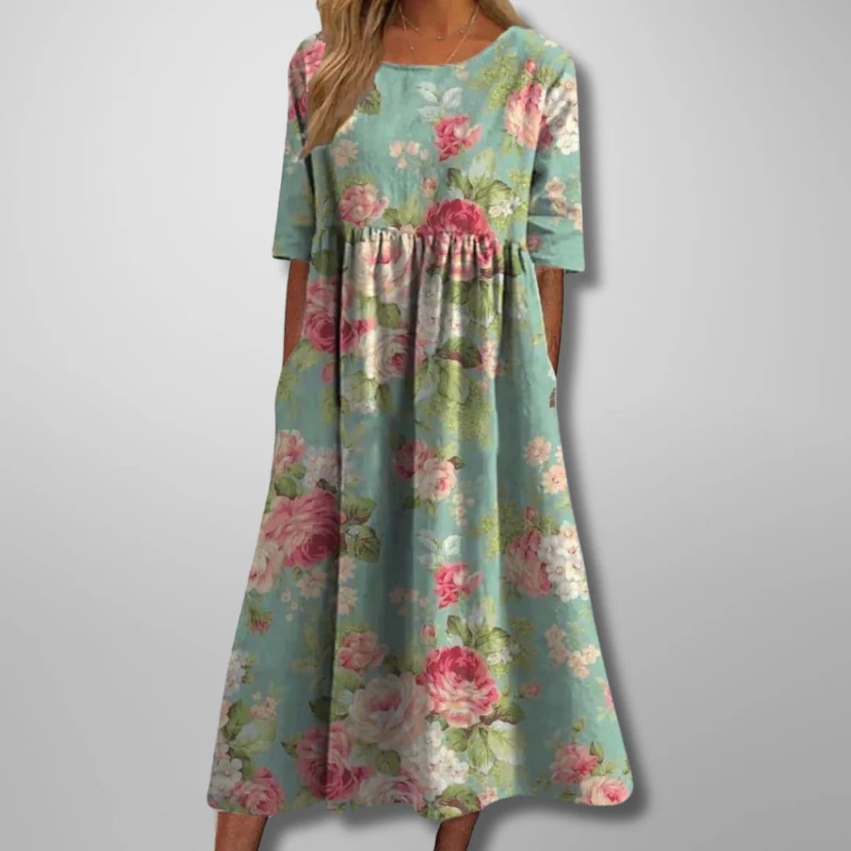 Relaxed floral midi dress with flowing silhouette and lightweight fabric.