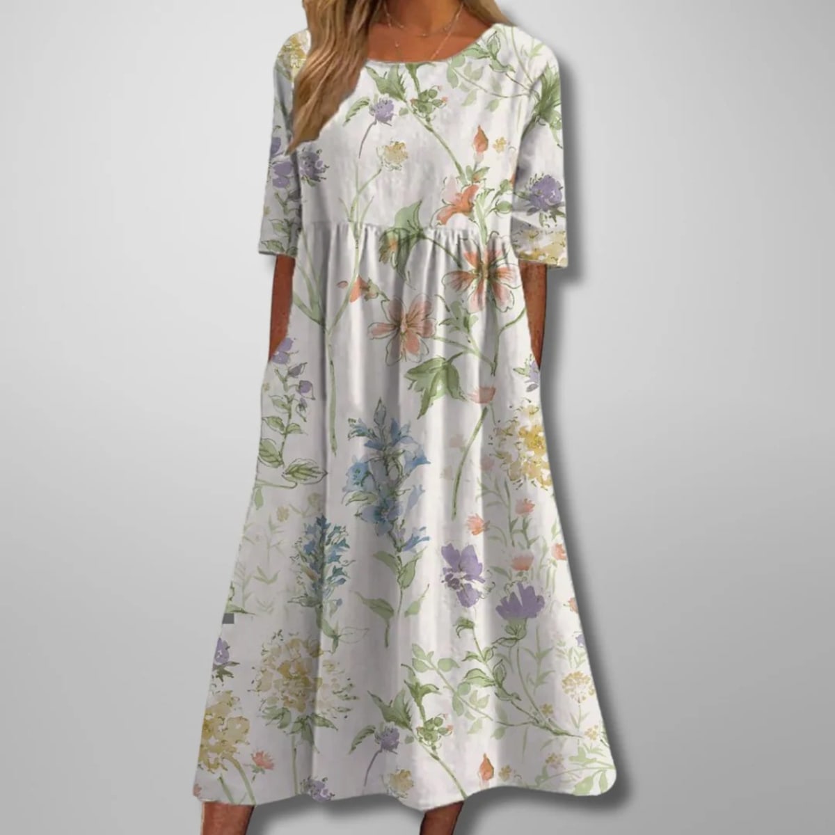 Relaxed floral midi dress with flowing silhouette and lightweight fabric.