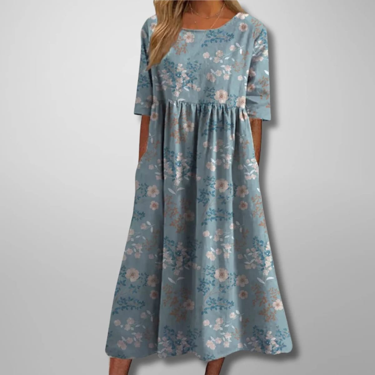 Relaxed floral midi dress with flowing silhouette and lightweight fabric.