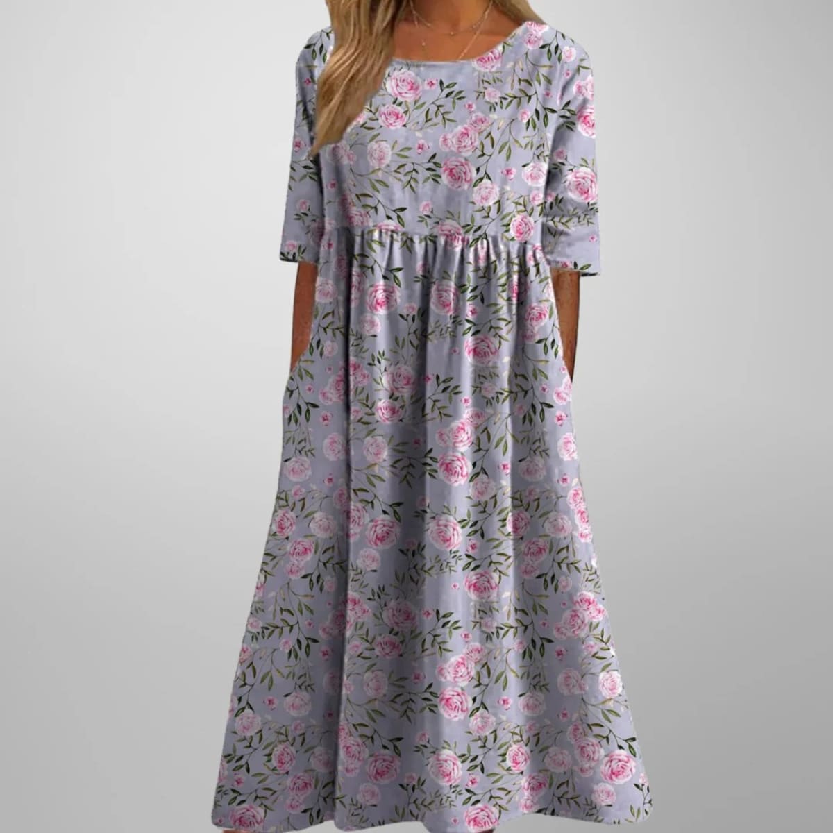 Relaxed floral midi dress with flowing silhouette and lightweight fabric.