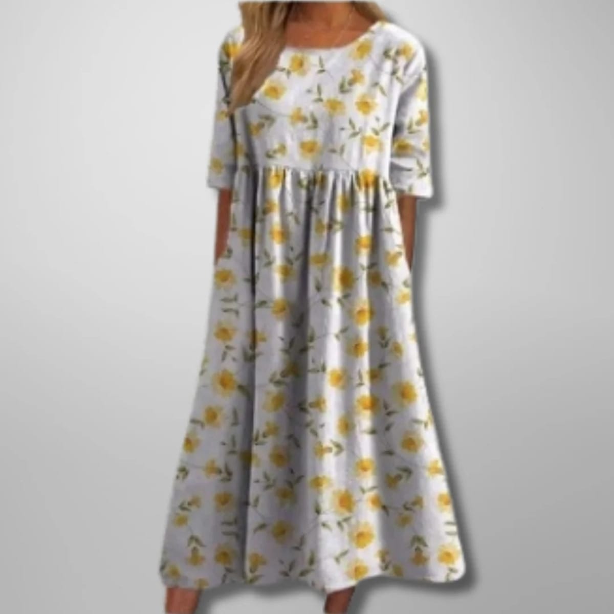 Relaxed floral midi dress with flowing silhouette and lightweight fabric.