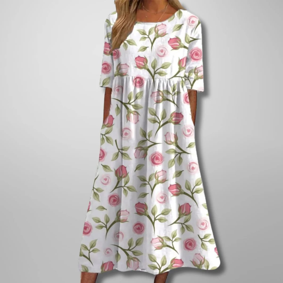 Relaxed floral midi dress with flowing silhouette and lightweight fabric.