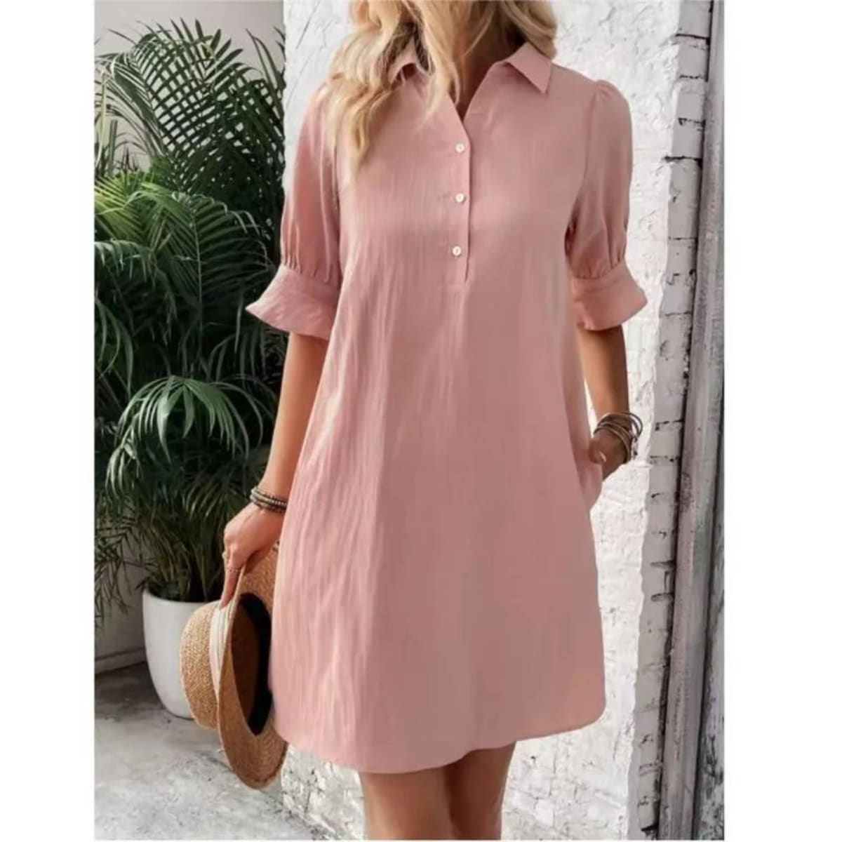 Button-down shirt dress with structured silhouette and relaxed fit.