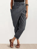High-waisted wrap front cropped pants with bow tie.