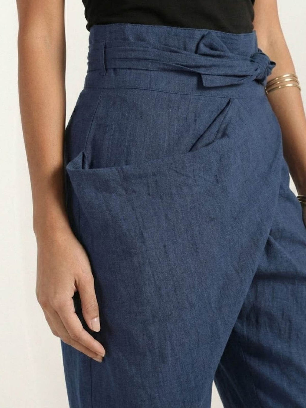 High-waisted wrap front cropped pants with bow tie.