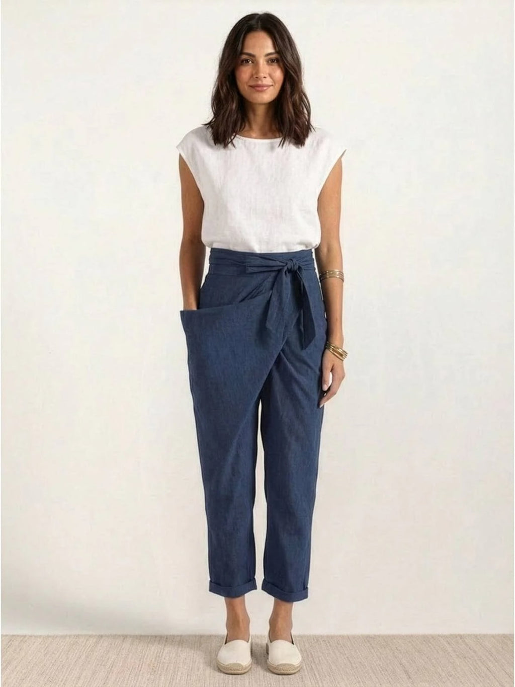 High-waisted wrap front cropped pants with bow tie.