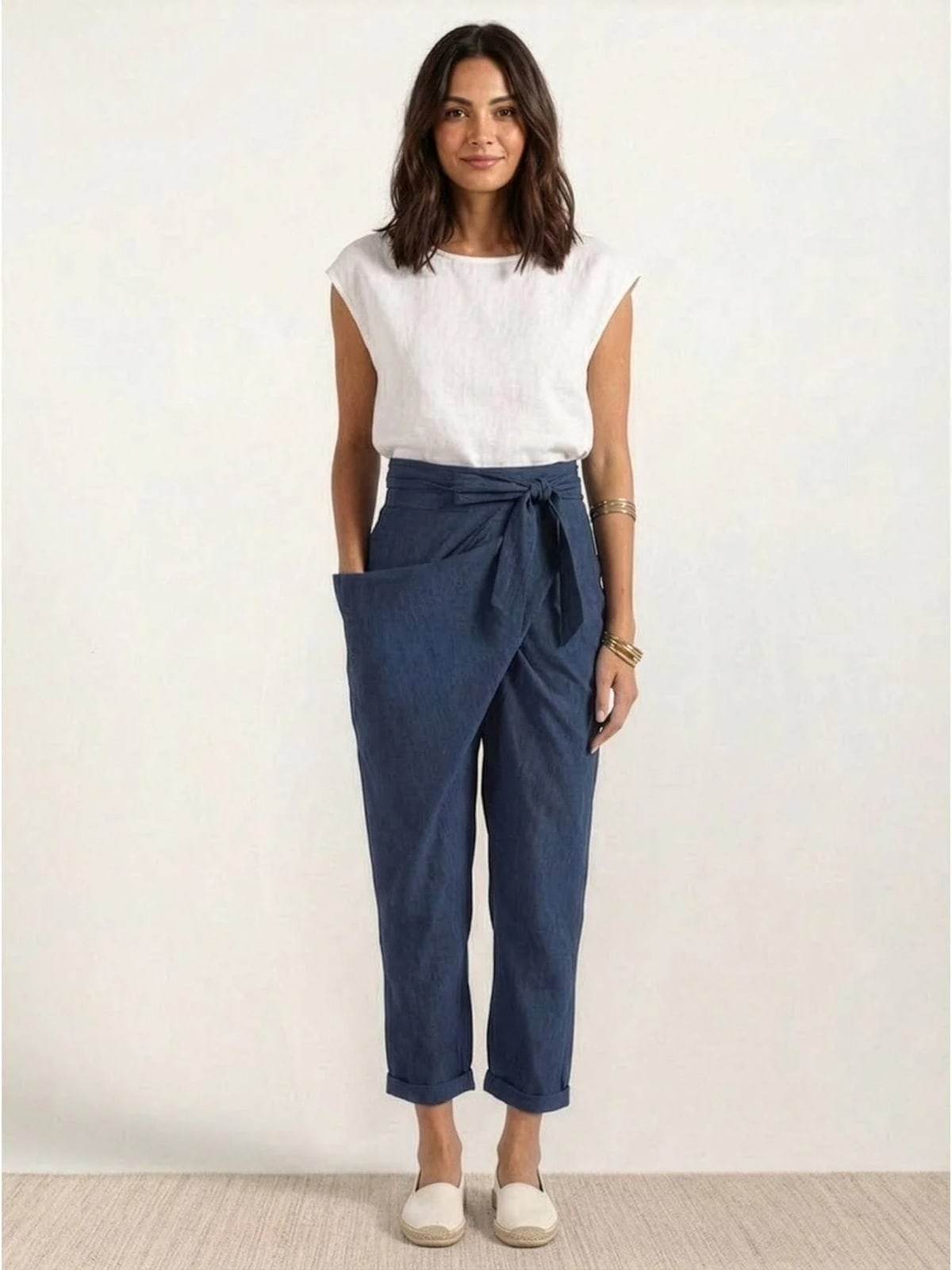 High-waisted wrap front cropped pants with bow tie.