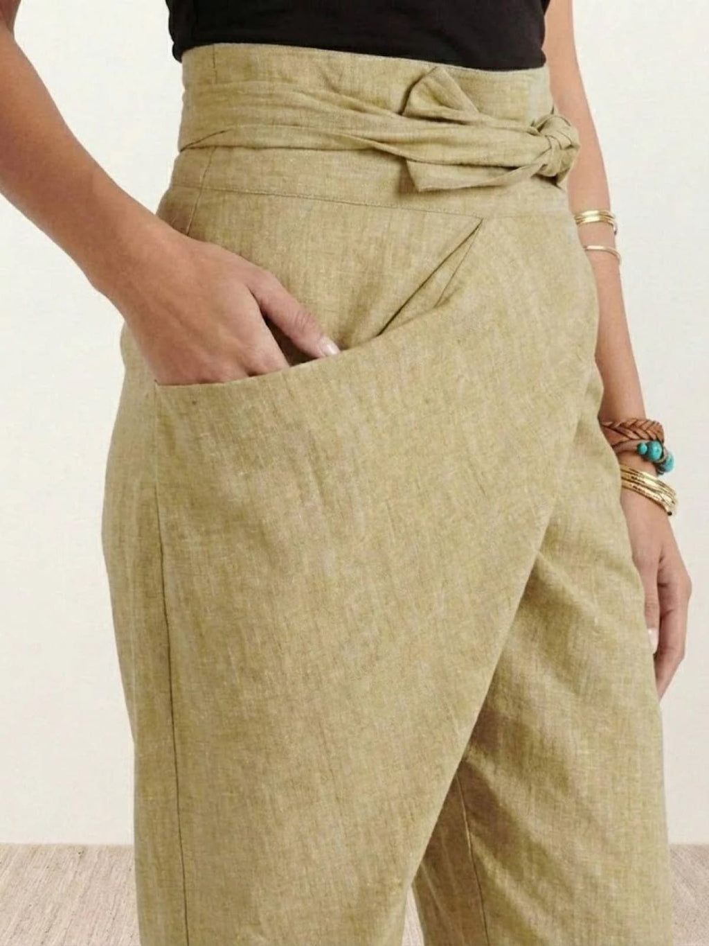 High-waisted wrap front cropped pants with bow tie.