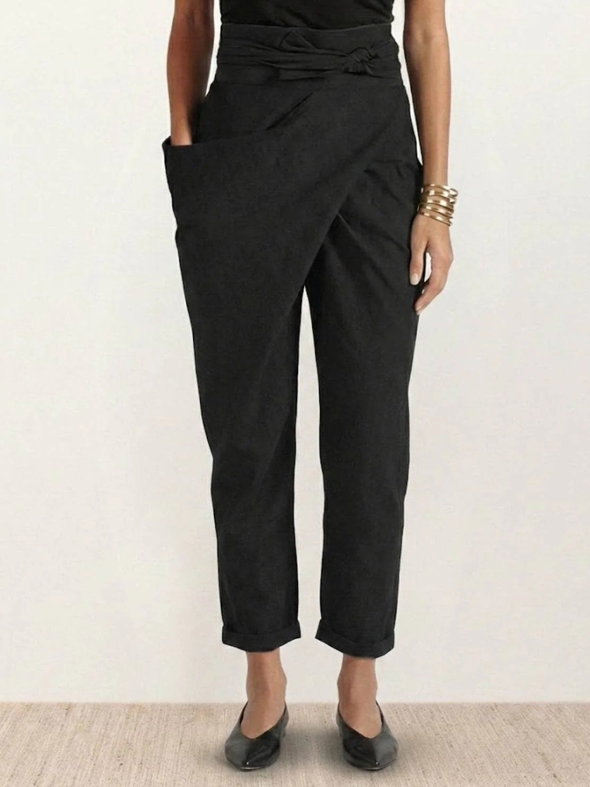 High-waisted wrap front cropped pants with bow tie.