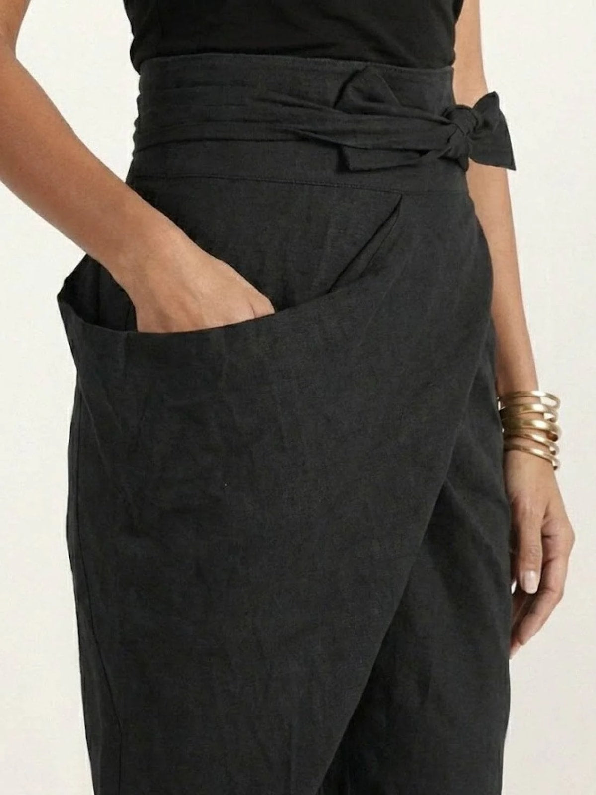 High-waisted wrap front cropped pants with bow tie.