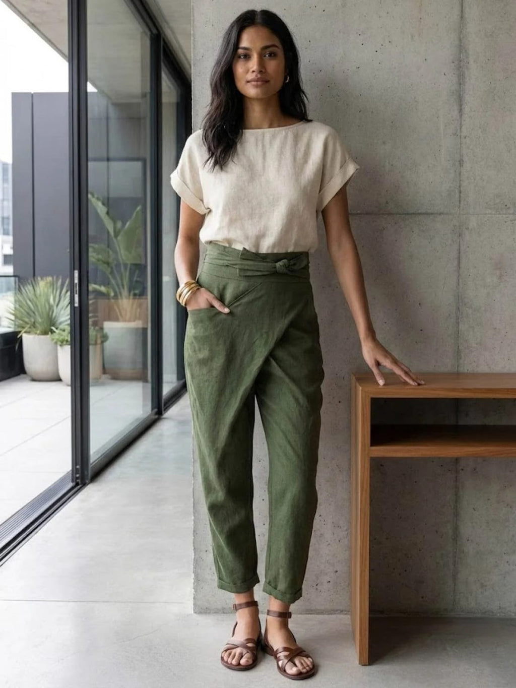 High-waisted wrap front cropped pants with bow tie.