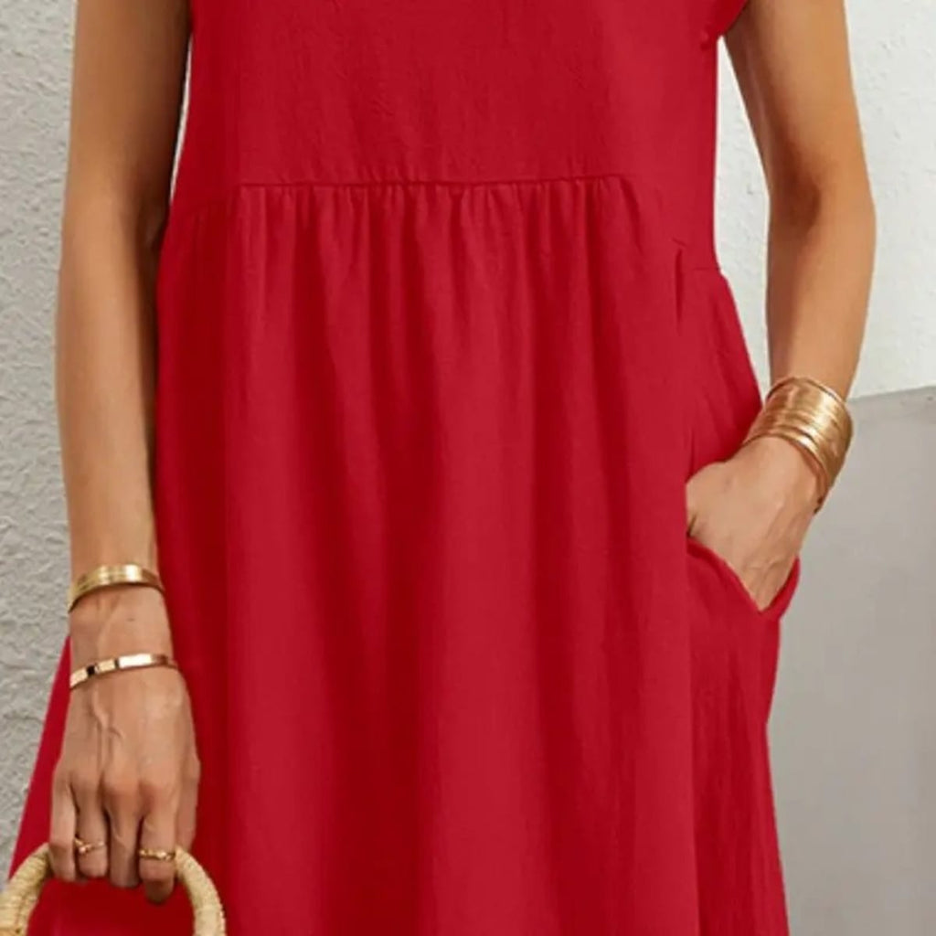 Casual dress with side pockets, relaxed fit.