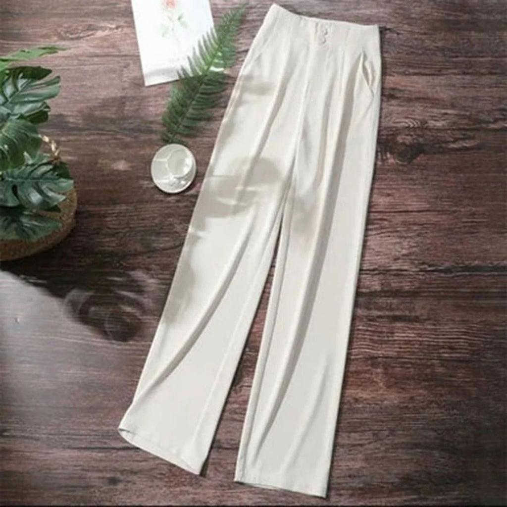 Women's high-waisted wide-leg pants with button closure.