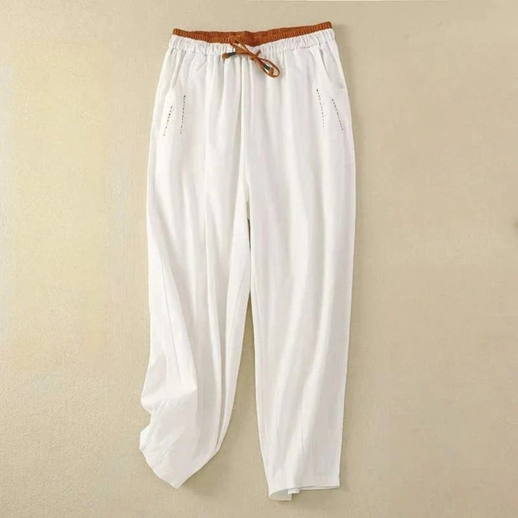 Relaxed pants with contrast waistband, soft fit from waist to ankle.