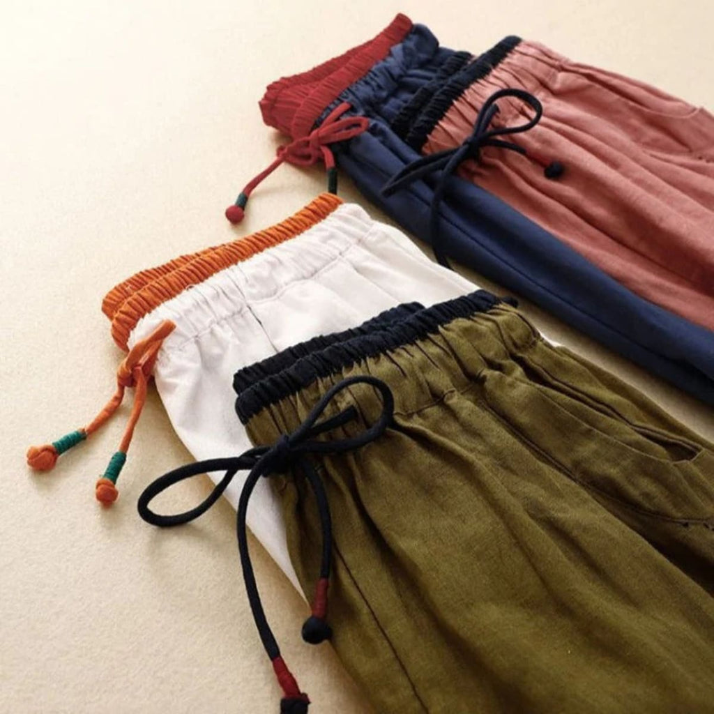 Relaxed pants with contrast waistband, soft fit from waist to ankle.