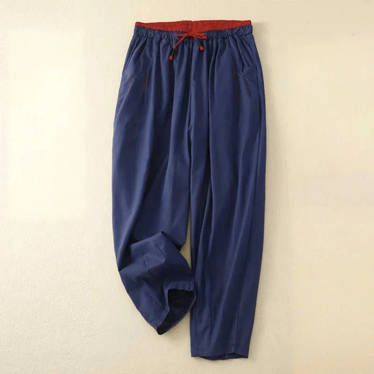 Relaxed pants with contrast waistband, soft fit from waist to ankle.