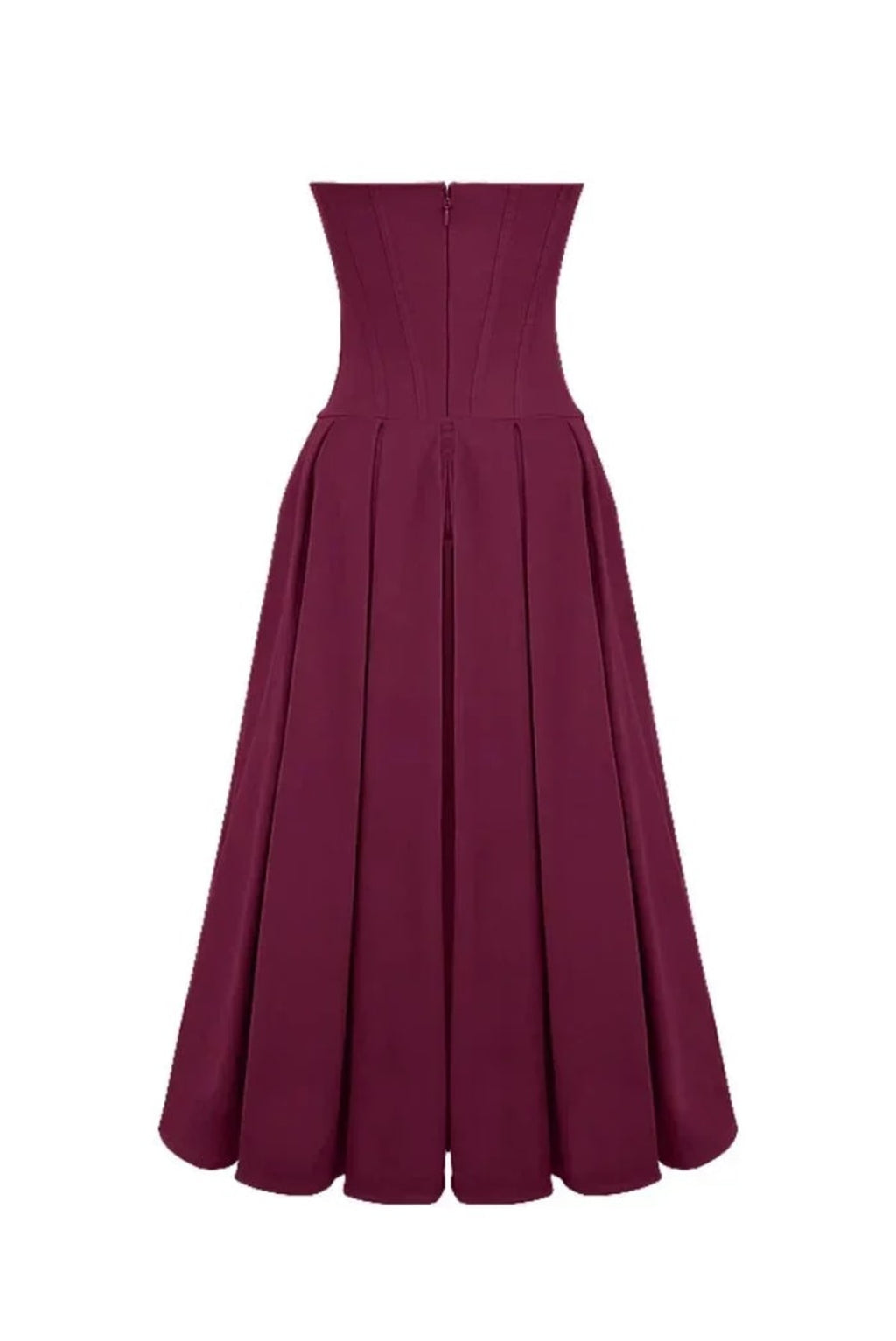 Woman modeling a strapless tea-length dress with pleated skirt.