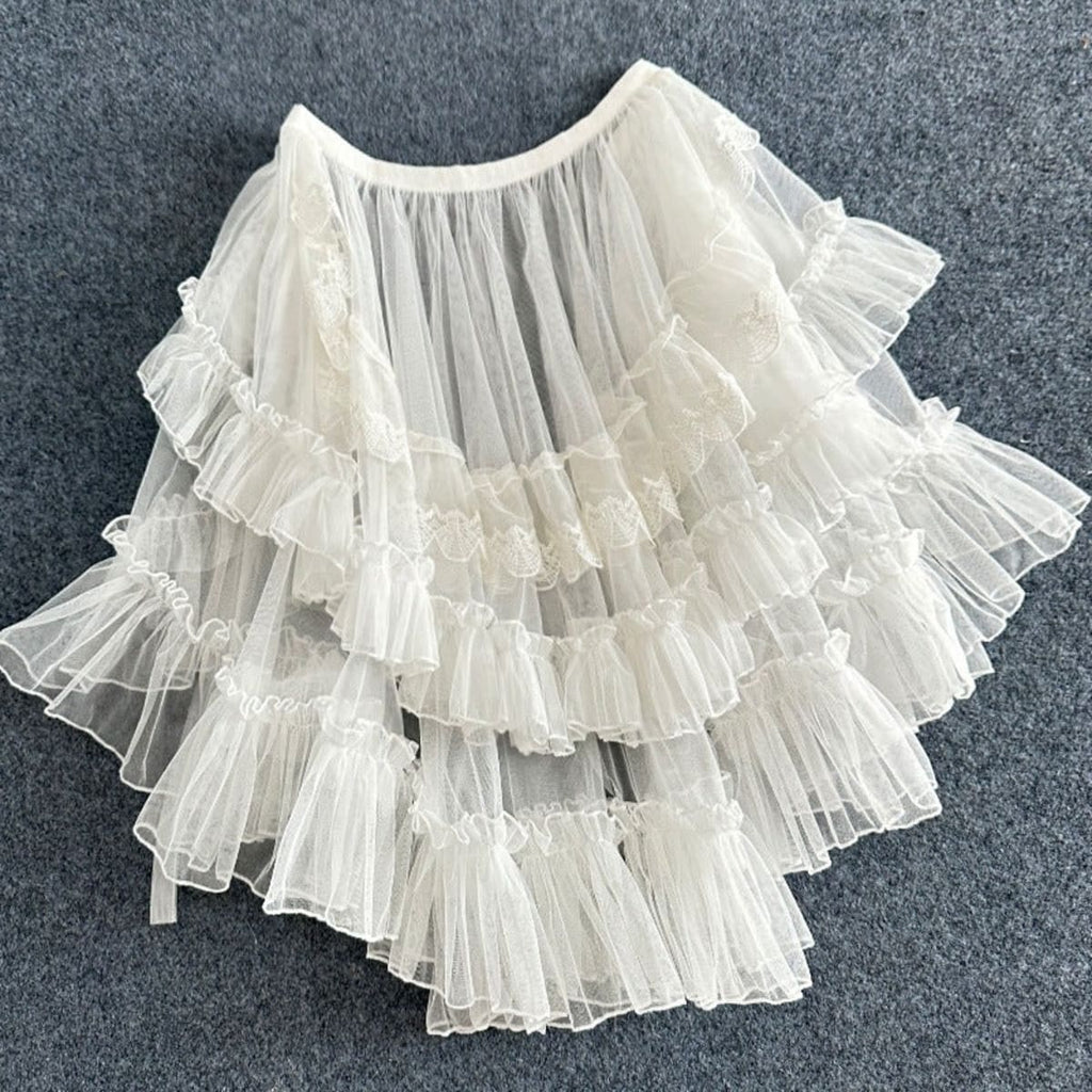 White layered ruffled skirt overlay with sheer tulle and lace.