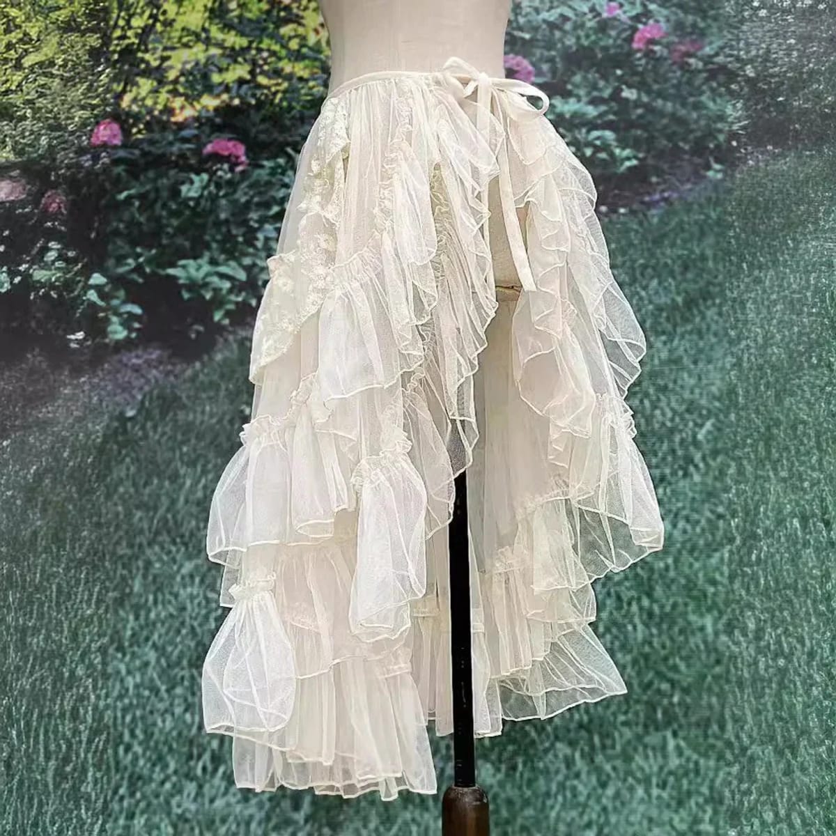 White layered ruffled skirt overlay with sheer tulle and lace.