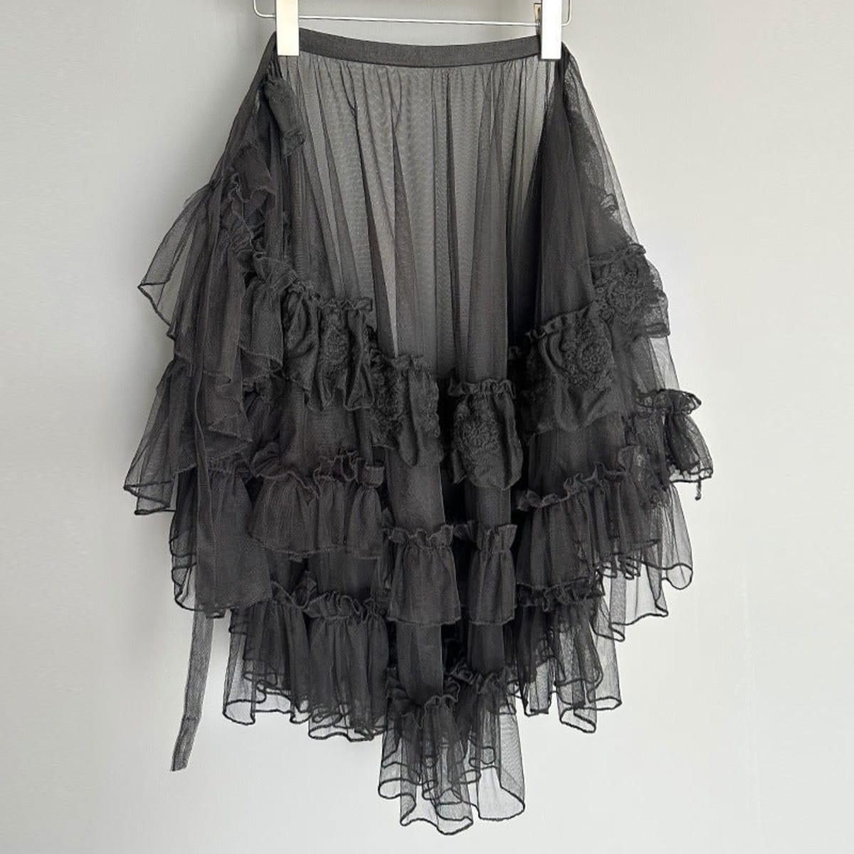 White layered ruffled skirt overlay with sheer tulle and lace.