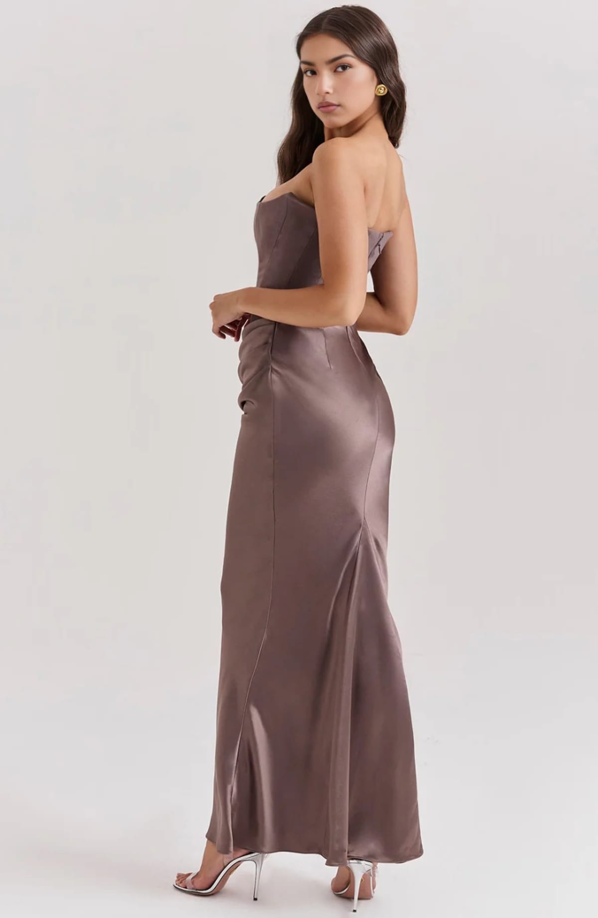 Strapless lace evening dress with flowing skirt, structured bodice.