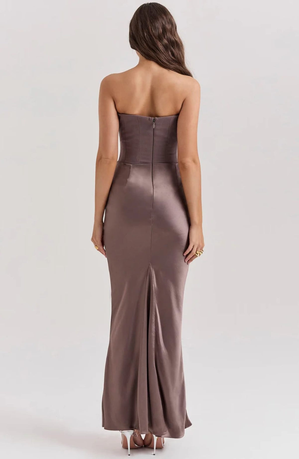 Strapless lace evening dress with flowing skirt, structured bodice.
