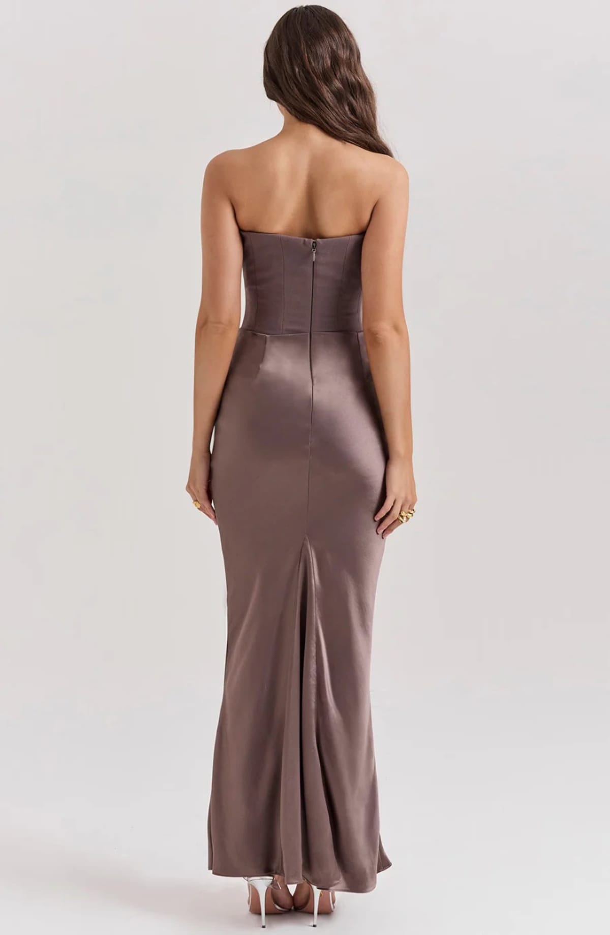 Strapless lace evening dress with flowing skirt, structured bodice.