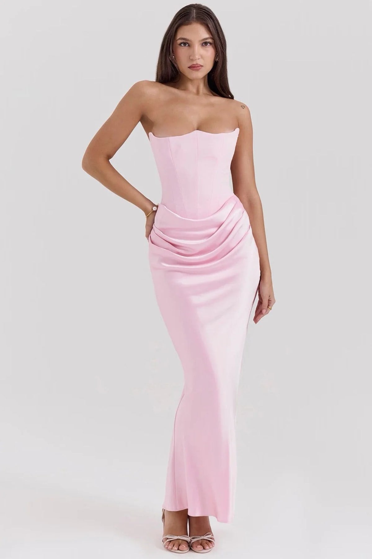 Strapless lace evening dress with flowing skirt, structured bodice.