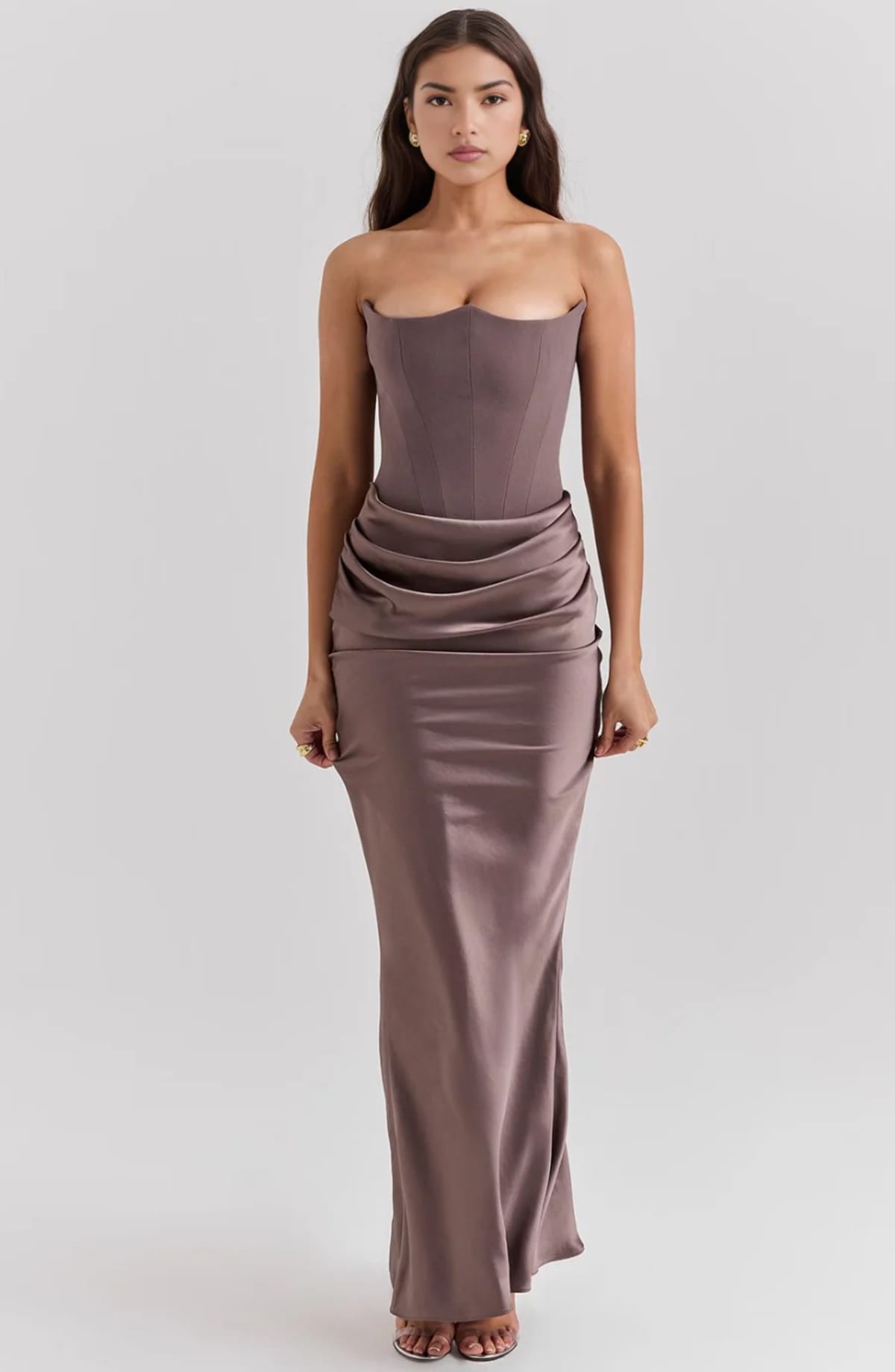Strapless lace evening dress with flowing skirt, structured bodice.